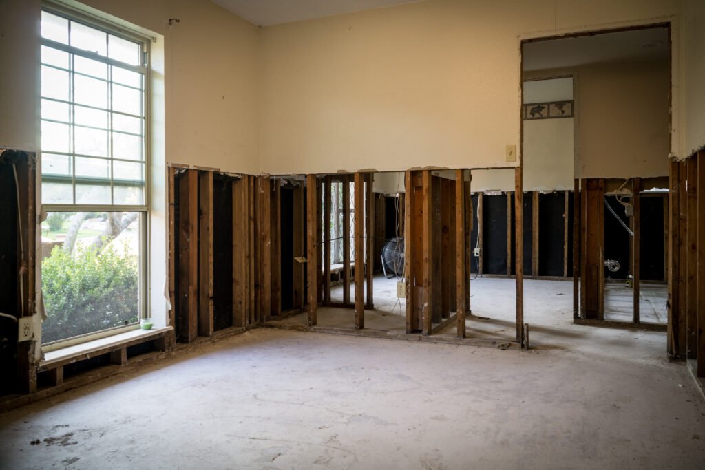 Inside home with walls torn out after hurricane
